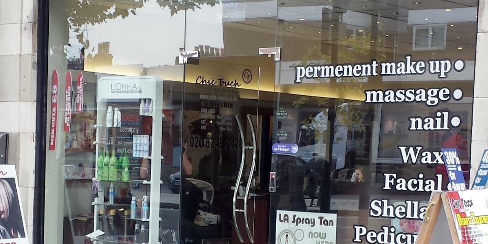 You hope this salon's permanent make-up is better than its spelling. Photograph by Graham Soult
