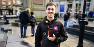 Andrew Bartlett using his ROAM app in Durham city centre
